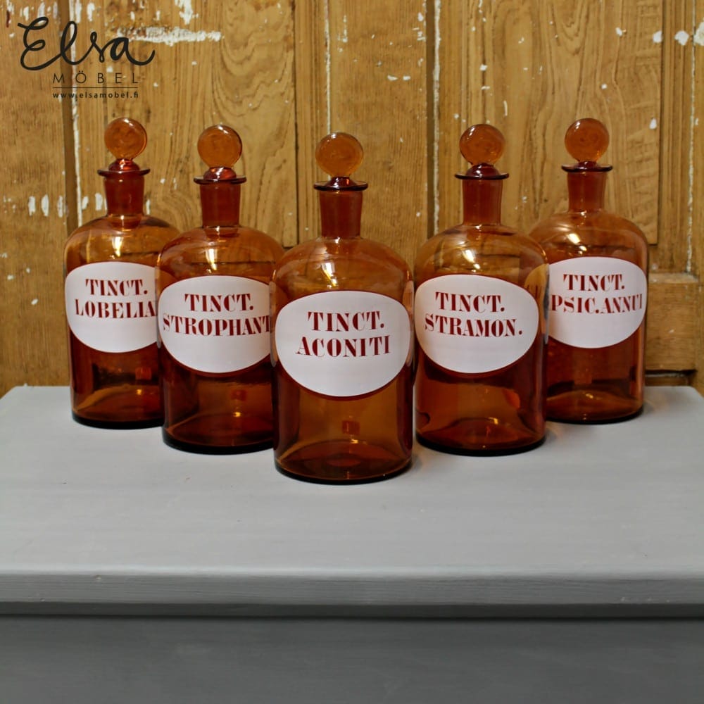 Apteekkipulloja koristeellisella korkilla featured image